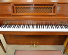 walnut Yamaha M304 console piano